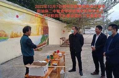  乐鱼(中国)一站式服务平台美术教师到油麻二中绘制艺术墙活动